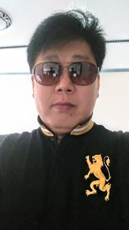 含笑半步癲的第二张照片--华安征婚网